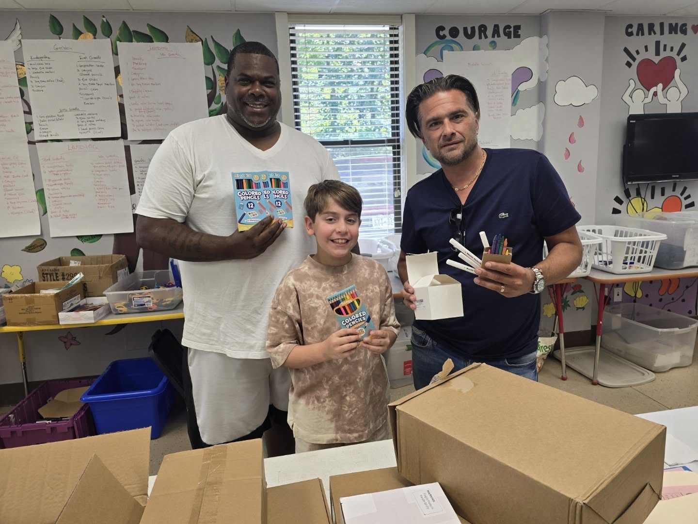Cal Krinsky with community supporters donating art supplies for local youth