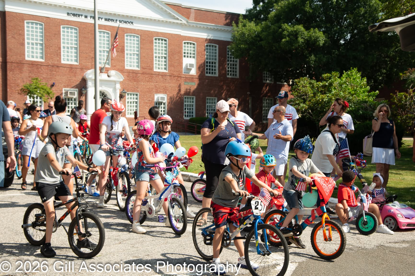 Children with decorated bicycles at the Glen Cove July 4th Bike Parade