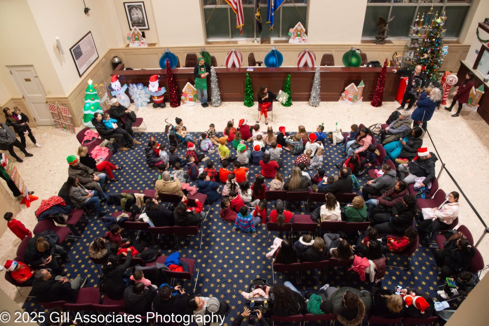 Families gathered at a Youth Bureau holiday event